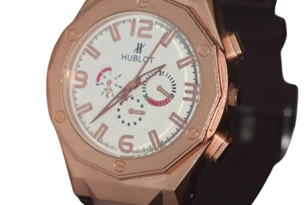 Luxurious Hublot Chronograph Long Edition Rose Gold-Tone Watch with White Dial, Multiple Sub-Dials, and Elegant Strap